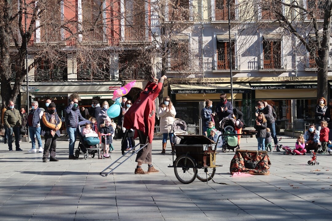 Croatian street musician playing accordion in a city square